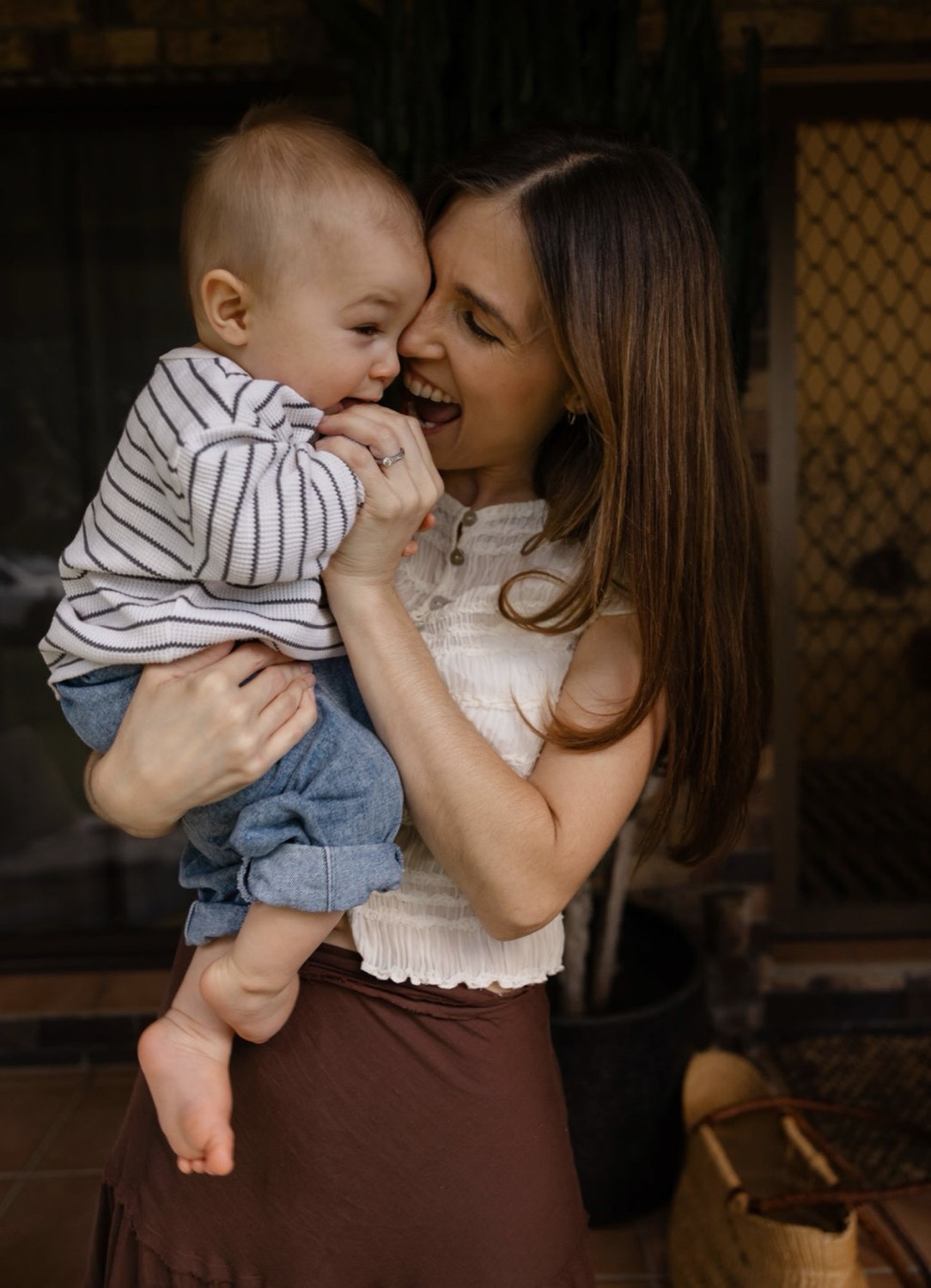Mother smiling with her baby